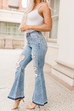 Sky Blue Light Wash Distressed High Rise Flare Jeans